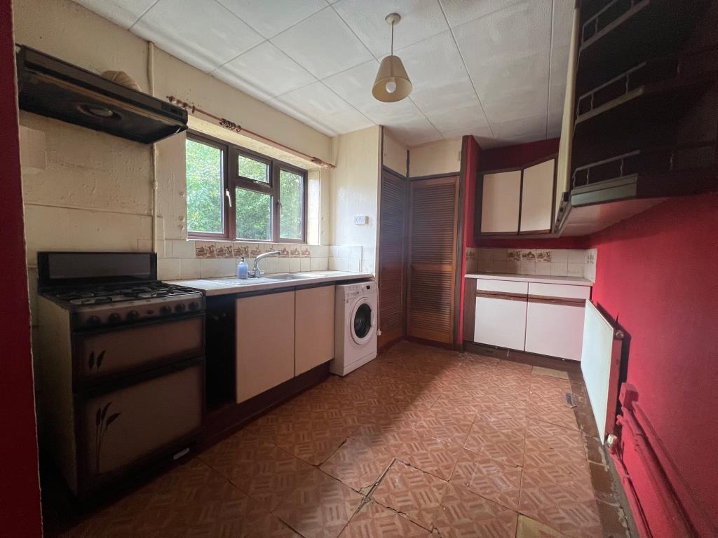 Lot: 13 - TWO-BEDROOM SEMI-DETACHED HOUSE - Kitchen with window to rear overlooking the garden